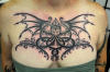 ornate_cthulu_chest-tattoo.jpg
